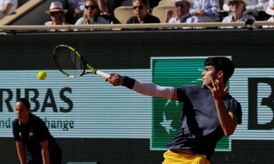 Spain's Carlos Alcaraz plays a shot against Italy's Jannik Sinner during their semifinal match of the French Open tennis tournament at the Roland Garros stadium in Paris, Friday, June 7, 2024. (AP Photo/Thibault Camus)