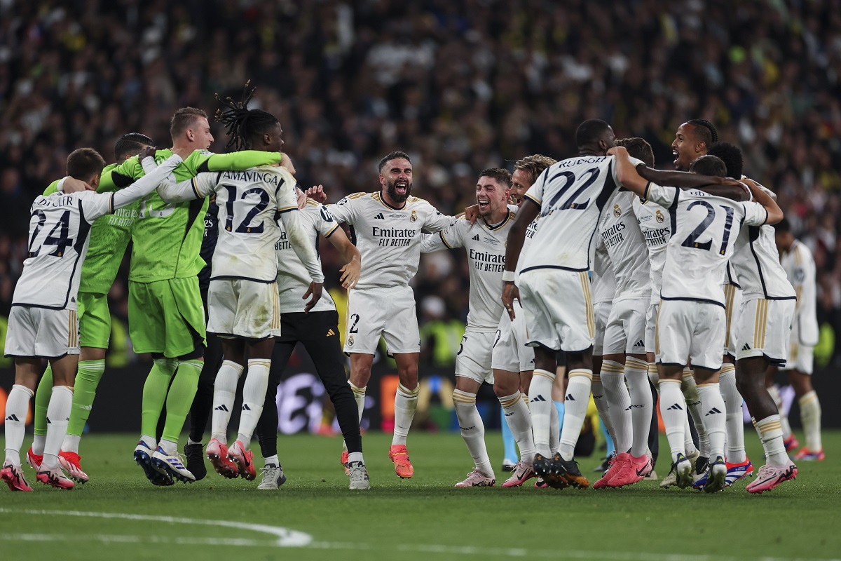 Real Madrid players at the end of the Champions League final soccer match between Borussia Dortmund and Real Madrid at Wembley stadium in London, Saturday, June 1, 2024. Real Madrid won 2-0. (AP Photo/Ian Walton)