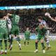 Tokyo Verdy's goalkeeper Yuya Nagasawa, right, makes a save during the friendly soccer match between Real Sociedad and Tokyo Verdy at the National Stadium Wednesday, May 29, 2024, in Tokyo. (AP Photo/Eugene Hoshiko)