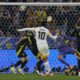 Germany's Jamal Musiala scores his side's second goal against Scotland's goalkeeper Angus Gunn during a Group A match between Germany and Scotland at the Euro 2024 soccer tournament in Munich, Germany, Friday, June 14, 2024. (AP Photo/Frank Augstein)