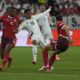 Switzerland's Manuel Akanji, left, challenges Germany's Jamal Musiala during a Group A match between Switzerland and Germany at the Euro 2024 soccer tournament in Frankfurt, Germany, Sunday, June 23, 2024. (AP Photo/Darko Vojinovic)