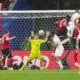 Turkey's Merih Demiral, top right,, heads the ball to scores his side's second goal during a round of sixteen match between Austria and Turkey at the Euro 2024 soccer tournament in Leipzig, Germany, Tuesday, July 2, 2024. (AP Photo/Martin Meissner)
