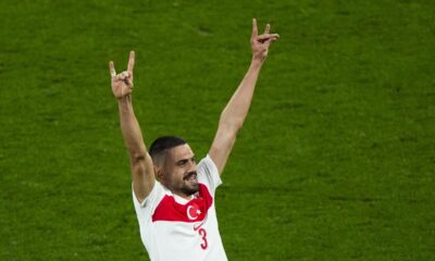 Turkey's Merih Demiral celebrates after scoring his side second goal during a round of sixteen match between Austria and Turkey at the Euro 2024 soccer tournament in Leipzig, Germany, Tuesday, July 2, 2024. UEFA has launched an investigation into Turkey soccer player Merih Demiral's “alleged inappropriate behavior” after he celebrated a goal at Euro 2024 by displaying a hand sign associated with an ultra-nationalist group. (AP Photo/Ebrahim Noroozi)