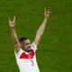 Turkey's Merih Demiral celebrates after scoring his side second goal during a round of sixteen match between Austria and Turkey at the Euro 2024 soccer tournament in Leipzig, Germany, Tuesday, July 2, 2024. UEFA has launched an investigation into Turkey soccer player Merih Demiral's “alleged inappropriate behavior” after he celebrated a goal at Euro 2024 by displaying a hand sign associated with an ultra-nationalist group. (AP Photo/Ebrahim Noroozi)