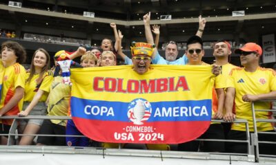 Fans of Colombia cheer for their team prior to a Copa America quarterfinal soccer match against Panama, in Glendale, Ariz., Saturday, July 6, 2024. (AP Photo/Rick Scuteri)