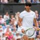 Daniil Medvedev of Russia celebrates after defeating Jannik Sinner of Italy in their quarterfinal match at the Wimbledon tennis championships in London, Tuesday, July 9, 2024. (AP Photo/Mosa'ab Elshamy)