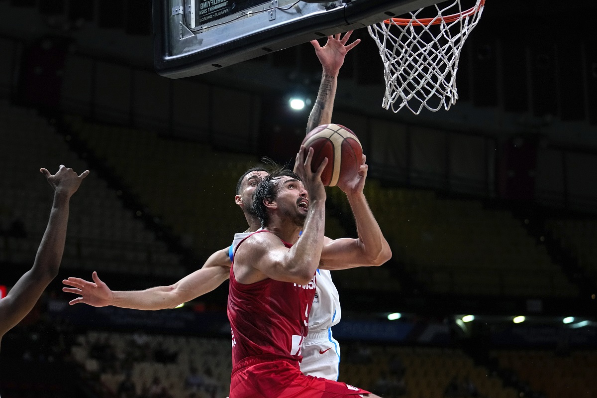 Croatia's Dario Saric tries to score against Dominican Republic, during the Acropolis basketball tournament, at the Peace and Friendship indoor stadium at Athens' port city of Piraeus, Greece, Saturday, July 6, 2024. (AP Photo/Petros Giannakouris)