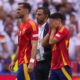 Spain's Pedri, right, covers his face after suffering an injury during a quarter final match between Germany and Spain at the Euro 2024 soccer tournament in Stuttgart, Germany, Friday, July 5, 2024. (AP Photo/Manu Fernandez)