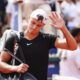 Denmark's Holger Rune looks dejected after retiring during his quarter final match against France's Arthur Fils, at the Hamburg ATP, Germany, Friday July 19, 2024. (Frank Molter/dpa via AP)