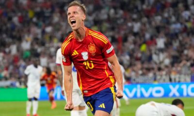 Spain's Dani Olmo celebrates after scoring his side's second goal during a semifinal match between Spain and France at the Euro 2024 soccer tournament in Munich, Germany, Tuesday, July 9, 2024. (AP Photo/Manu Fernandez)
