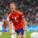 Spain's Dani Olmo celebrates after scoring his side's second goal during a semifinal match between Spain and France at the Euro 2024 soccer tournament in Munich, Germany, Tuesday, July 9, 2024. (AP Photo/Manu Fernandez)