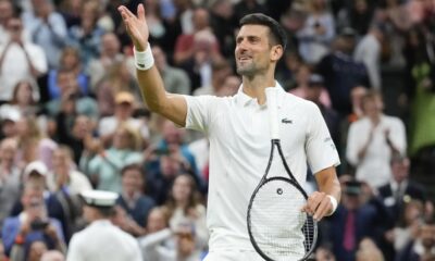 Novak Djokovic of Serbia reacts after defeating Alexei Popyrin of Australia in their third round match at the Wimbledon tennis championships in London, Saturday, July 6, 2024. (AP Photo/Kirsty Wigglesworth)