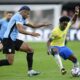 Uruguay's Ronald Araujo, left, challenges Brazil's Endrick during a Copa America quarterfinal soccer match in Las Vegas, Saturday, July 6, 2024. (AP Photo/Godofredo A. Vásquez)