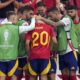 Spain's Pedri (20) is consoled by teammates after he was taken out of the game following an injury in a quarterfinal match between Germany and Spain at the Euro 2024 soccer tournament in Stuttgart, Germany, Friday, July 5, 2024. (AP Photo/Antonio Calanni)