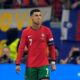 Portugal's Cristiano Ronaldo reacts during a round of sixteen match between Portugal and Slovenia at the Euro 2024 soccer tournament in Frankfurt, Germany, Monday, July 1, 2024. (AP Photo/Matthias Schrader)