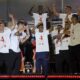 Spain's team captain Alvaro Morata introduces player Lamine Yamal, center, to the fans during celebrations of the Spanish team's European soccer championship title on a stage at Cibeles square in Madrid, Monday, July 15, 2024. Spain defeated England in the final of the Euro 2024 soccer tournament in Berlin on Sunday evening. (AP Photo/Andrea Comas)