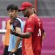 FC Bayern Munich's new head coach Vincent Kompany, right, an new player Hiroki Ito, left, attend a team's training session in Munich, Germany, Wednesday, July 17, 2024. (Sven Hoppe/dpa via AP)