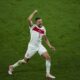 Turkey's Merih Demiral celebrates after scoring his side second goal during a round of sixteen match between Austria and Turkey at the Euro 2024 soccer tournament in Leipzig, Germany, Tuesday, July 2, 2024. (AP Photo/Ebrahim Noroozi)