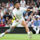 Novak Djokovic of Serbia plays a forehand return to Hulger Rune of Denmark during their fourth round match at the Wimbledon tennis championships in London, Monday, July 8, 2024. (AP Photo/Kirsty Wigglesworth)