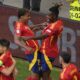 Spain's Lamine Yamal, top left celebrates with Spain's Nico Williams, top right and other team mates after Dani Olmo scored the opening goal during a quarter final match between Germany and Spain at the Euro 2024 soccer tournament in Stuttgart, Germany, Friday, July 5, 2024. (AP Photo/Michael Probst)