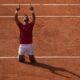 Serbia's Novak Djokovic reacts after defeating Spain's Carlos Alcaraz in the men's singles tennis final at the Roland Garros stadium during the 2024 Summer Olympics, Sunday, Aug. 4, 2024, in Paris, France. (AP Photo/Andy Wong)