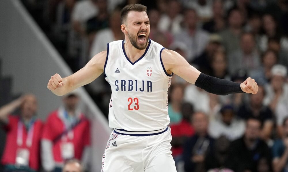 Serbia's Marko Guduric celebrates after Serbia scored during a men's basketball game against South Sudan at the 2024 Summer Olympics, Saturday, Aug. 3, 2024, in Villeneuve-d'Ascq, France. (AP Photo/Michael Conroy)