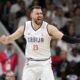 Serbia's Marko Guduric celebrates after Serbia scored during a men's basketball game against South Sudan at the 2024 Summer Olympics, Saturday, Aug. 3, 2024, in Villeneuve-d'Ascq, France. (AP Photo/Michael Conroy)