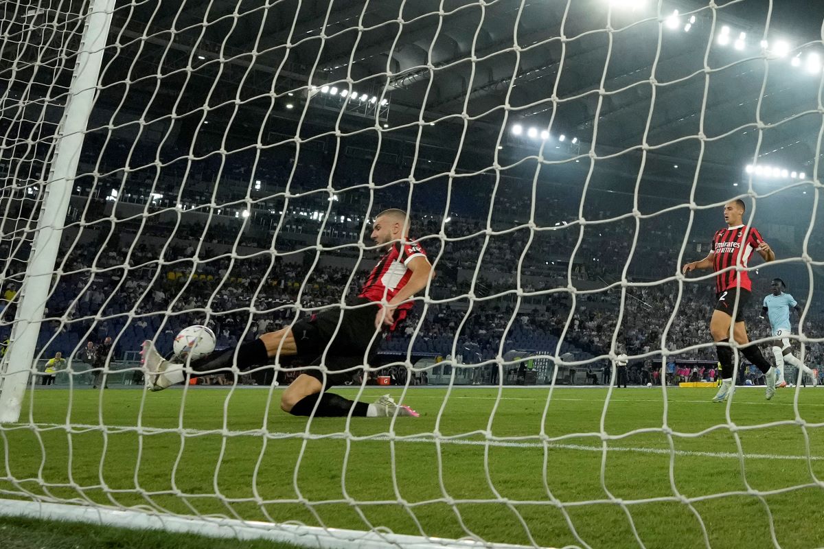 AC Milan's Strahinja Pavlovic saves a goal during a Serie A soccer match between Lazio and AC Milan, at Rome's Stadio Olimpico, Saturday, Aug. 31, 2024. (AP Photo/Andrew Medichini)