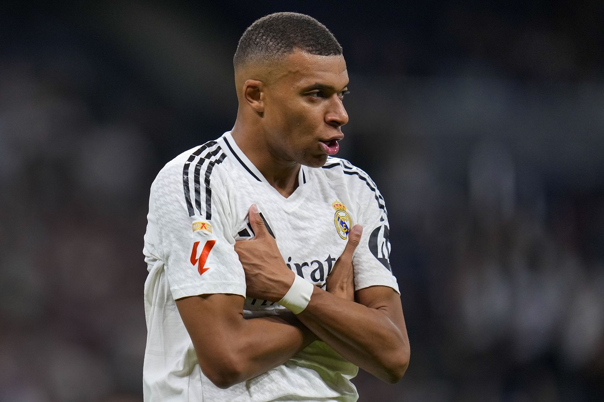 Real Madrid's Kylian Mbappe celebrates after scoring his side's second goal during a Spanish La Liga soccer match between Real Madrid and Alaves at Santiago Bernabeu stadium in Madrid, Spain, Tuesday, Sept. 24, 2024. (AP Photo/Manu Fernandez)