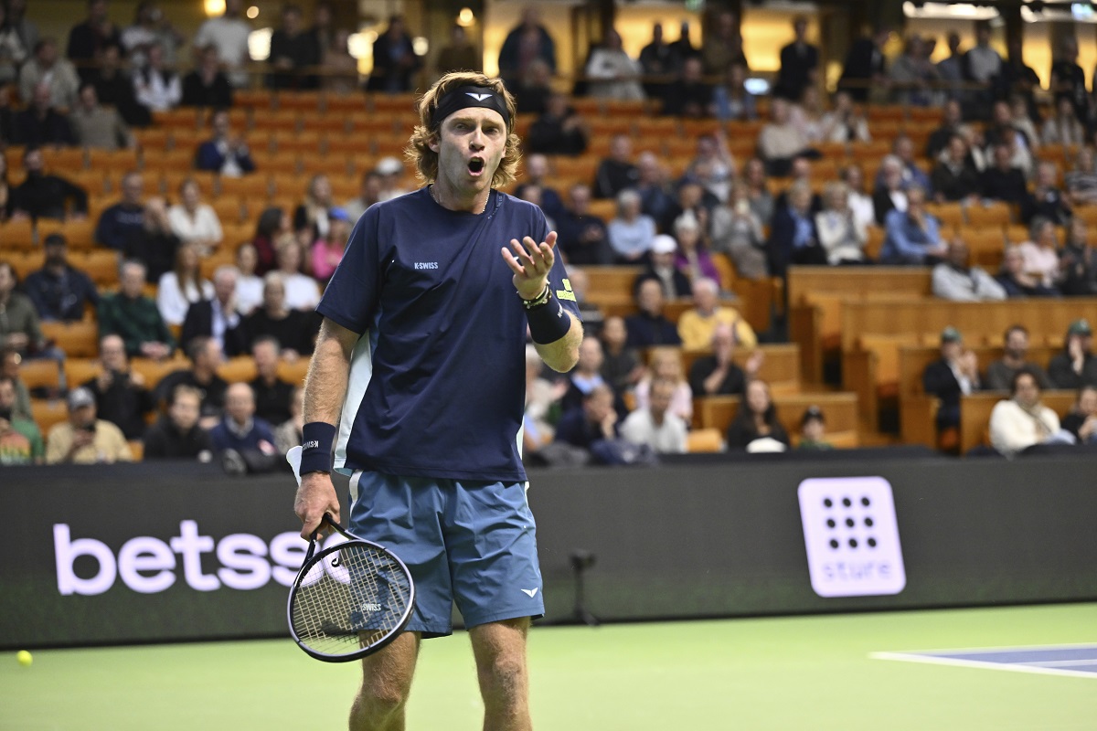 Russia's Andrei Rublev reacts during the quarter-final Nordic Open ATP tennis match against Switzerland's Stan Wawrinka, at the Royal Tennis Hall in Stockholm, Sweden, Friday Oct. 18, 2024. (Anders Wiklund/TT News Agency via AP)