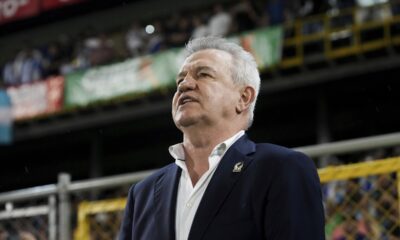 Mexico's coach Javier Aguirre signs his national anthem prior to a CONCACAF Nations League quarterfinals first leg soccer match against Honduras, at Francisco Morazan stadium in San Pedro Sula, Honduras, Friday, Nov. 15, 2024. (AP Photo/Moises Castillo)