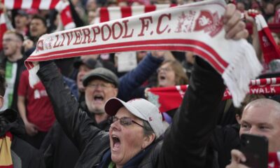 Navijači Liverpula, Liverpool's supporter cheers during the English Premier League soccer match between Liverpool and Brighton at the Anfield stadium in Liverpool, England, Saturday, Nov. 2, 2024. (AP Photo/Jon Super)