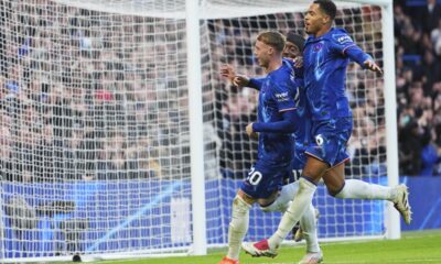 Chelsea's Cole Palmer, left, celebrates after scoring his side's third goal during the English Premier League soccer match between Chelsea and Aston Villa at the Stamford Bridge stadium in London, Sunday, Dec. 1, 2024. (AP Photo/Kirsty Wigglesworth)