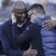 Genoa's head coach Patrick Vieira, left, and Empoli's head coach Roberto D'Aversa hug before the Serie A soccer match between Empoli and Genoa at the Carlo Castellani stadium in Empoli, Italy, Saturday, Dec. 28, 2024. (Marco Bucco/LaPresse via AP)