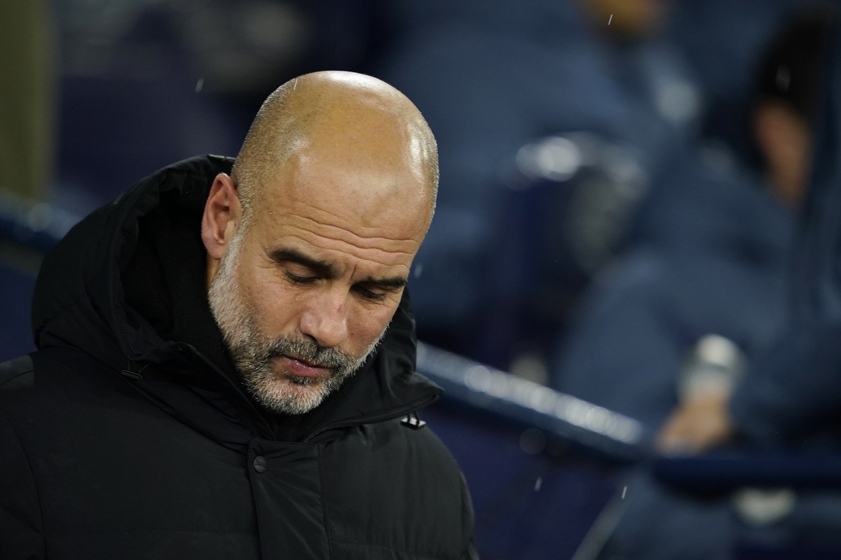 Manchester City's head coach Pep Guardiola waits for the start of the English Premier League soccer match between Manchester City and Nottingham Forest at the Etihad Stadium in Manchester, Wednesday, Dec. 4, 2024. (AP Photo/Dave Thompson)
