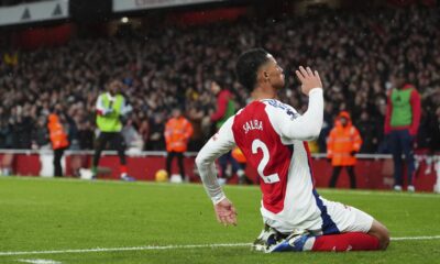 Arsenal's William Saliba celebrates after scoring his side's second goal during the English Premier League soccer match between Arsenal and Manchester United at Emirates stadium in London, Wednesday, Dec. 4, 2024. (AP Photo/Kirsty Wigglesworth)