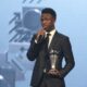 Vinicius Junior of Real Madrid talks after being awarded as the Best Men's FIFA Player during the FIFA Football Awards 2024 in Doha, Qatar, Tuesday, Dec. 17, 2024. (AP Photo/Hussein Sayed)