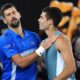Novak Djokovic, left, of Serbia, is congratulated by Carlos Alcaraz of Spain following their quarterfinal match at the Australian Open tennis championship in Melbourne, Australia, Wednesday, Jan. 22, 2025. (AP Photo/Vincent Thian)