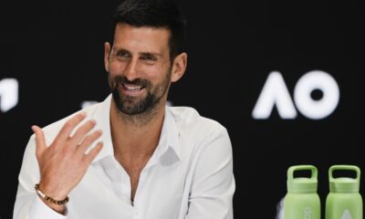 Serbia's Novak Djokovic reacts during a press conference ahead of the Australian Open tennis championship in Melbourne, Australia, Friday, Jan. 10, 2025. (AP Photo/Ng Han Guan)