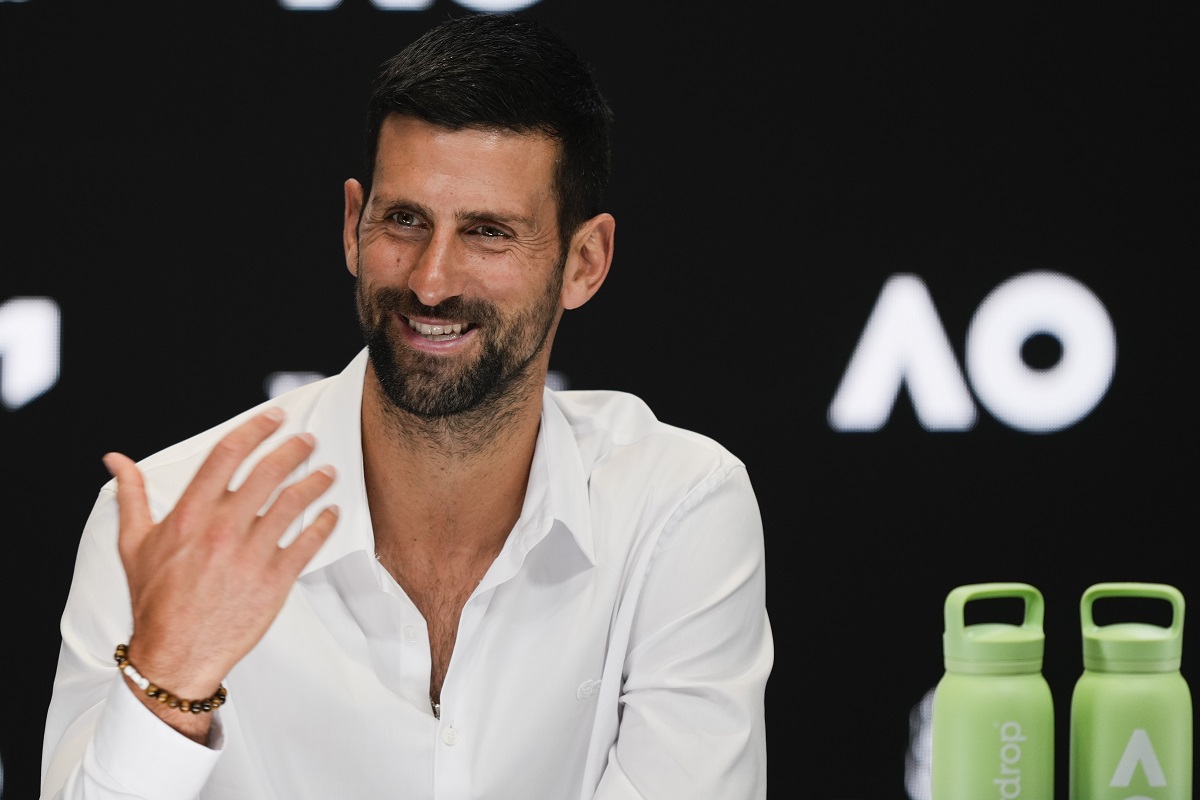 Serbia's Novak Djokovic reacts during a press conference ahead of the Australian Open tennis championship in Melbourne, Australia, Friday, Jan. 10, 2025. (AP Photo/Ng Han Guan)