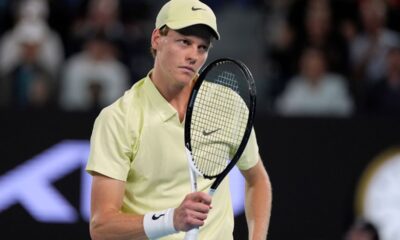 Jannik Sinner of Italy reacts during his quarterfinal match against Alex de Minaur of Australia at the Australian Open tennis championship in Melbourne, Australia, Wednesday, Jan. 22, 2025. (AP Photo/Asanka Brendon Ratnayake)
