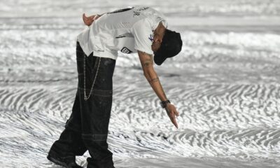 Brazilian soccer player Neymar greets fans during his presentation ceremony after signing a six-month contract with Santos FC at Vila Belmiro Stadium in Santos, Brazil, Friday, Jan. 31, 2025. (AP Photo/Andre Penner)