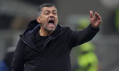 AC Milan's head coach Sergio Conceicao directs his players during the Italian Serie A soccer match between AC Milan and Hellas Verona, at the San Siro Stadium in Milan, Italy, Saturday, Feb. 15, 2025. (Spada/LaPresse via AP)