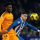 Real Madrid's Aurelien Tchouameni, left, challenges for the ball with Espanyol's Roberto Fernandez during a Spanish La Liga soccer match between Espanyol and Real Madrid at the Lluis Companys Olympic Stadium in Barcelona, Spain, Saturday Feb.1, 2025. (AP Photo/Joan Monfort)