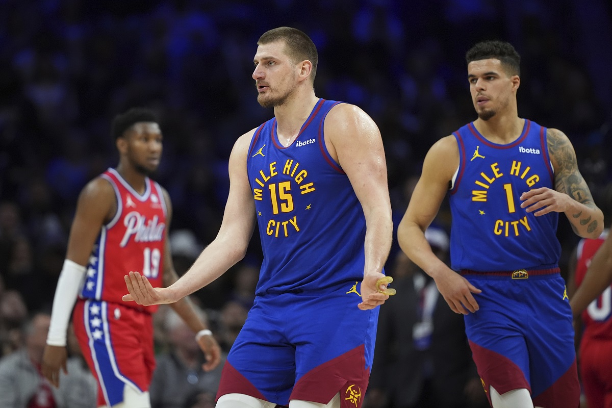Denver Nuggets' Nikola Jokic reacts after scoring during the second half of an NBA basketball game against the Philadelphia 76ers, Friday, Jan. 31, 2025, in Philadelphia. (AP Photo/Matt Slocum)