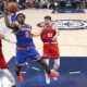 New York Knicks forward OG Anunoby, center, shoots as Los Angeles Clippers center Ivica Zubac, left, and guard Bogdan Bogdanovic defend during the second half of an NBA basketball game Friday, March 7, 2025, in Inglewood, Calif. (AP Photo/Mark J. Terrill)