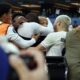 Panama's Cecilio Waterman Ruiz takes former French footballer Thierry Henry in his arm after he jumped on the nearby TV set after scoring against the United States during the second half of a CONCACAF Nations League semifinal soccer match Thursday, March 20, 2025, in Inglewood, Calif. (AP Photo/Etienne Laurent)
