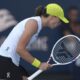 Iga Swiatek, of Poland, reacts after winning a point against Caroline Garcia, of France, during the Miami Open tennis tournament, Friday, March 21, 2025, in Miami Gardens, Fla. (AP Photo/Lynne Sladky)