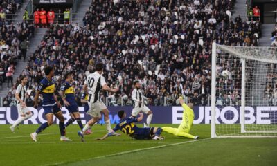 Juventus' Kenan Yildiz scores their side's first goal of the game during the Serie A soccer match between Juventus and Genoa at the Juventus Stadium in Turin, Italy, Saturday March 29, 2025. (Fabio Ferrari/LaPresse via AP)