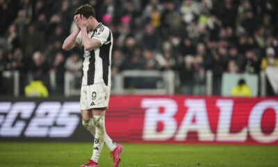 Juventus' Dusan Vlahovic reacts after missing his kick during a penalty shootout in an Italian Cup quarterfinal soccer match between Juventus and Empoli at the Allianz Stadium in Turin, Italy, Wednesday, Feb. 26, 2025 (Marco Alpozzi/LaPresse via AP)